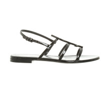 Saint Laurent Cassandra Flat Sandals aus Lackleder in Schwarz