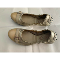 Tod's Slippers/Ballerina's Leer in Goud