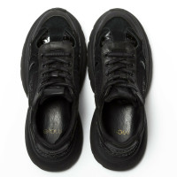 Maje Sneakers aus Leder in Schwarz
