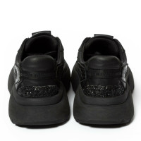 Maje Sneakers aus Leder in Schwarz
