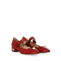 Gucci Slipper/Ballerinas aus Leder in Rot