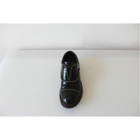 Brunello Cucinelli Sneakers aus Leder in Schwarz