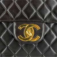 Chanel Jumbo Reissue 2.55 Leer in Bruin