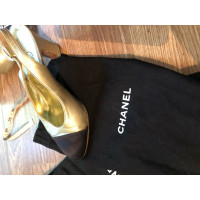 Chanel Pumps/Peeptoes aus Leder in Gold