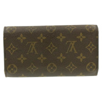 Louis Vuitton Täschchen/Portemonnaie aus Canvas in Braun