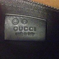 Gucci  Python en cuir clutch 