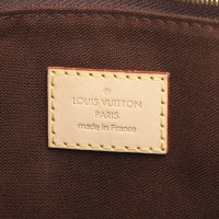 Louis Vuitton Menilmontant in Tela in Marrone