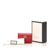 Gucci Täschchen/Portemonnaie aus Leder in Rot