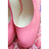 Christian Louboutin Pumps/Peeptoes aus Lackleder in Rosa / Pink
