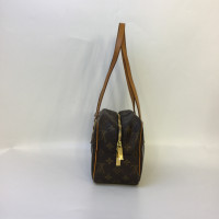 Louis Vuitton Cite Patent leather in Brown