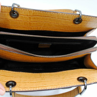 Lancel Handtasche aus Leder in Ocker