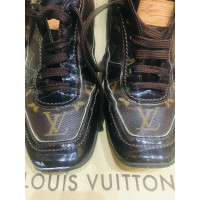 Louis Vuitton Sneakers Leer in Bruin