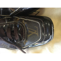 Louis Vuitton Sneakers Leer in Bruin