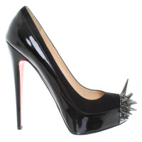 Christian Louboutin pumps met spiked studs