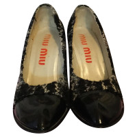 Miu Miu pumps met Tweed