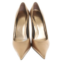 Stuart Weitzman Pumps/Peeptoes en Cuir en Doré