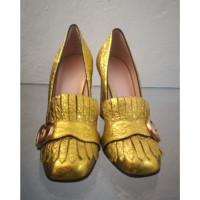 Gucci Pumps/Peeptoes Leather in Gold