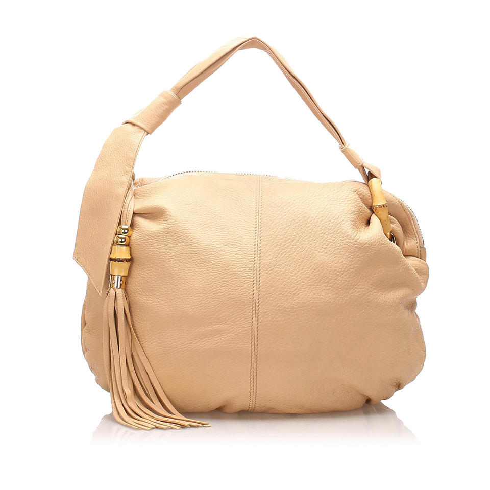 Gucci Umhängetasche aus Leder in Beige