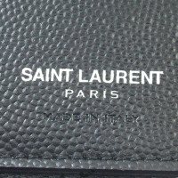 Saint Laurent Täschchen/Portemonnaie aus Leder in Schwarz