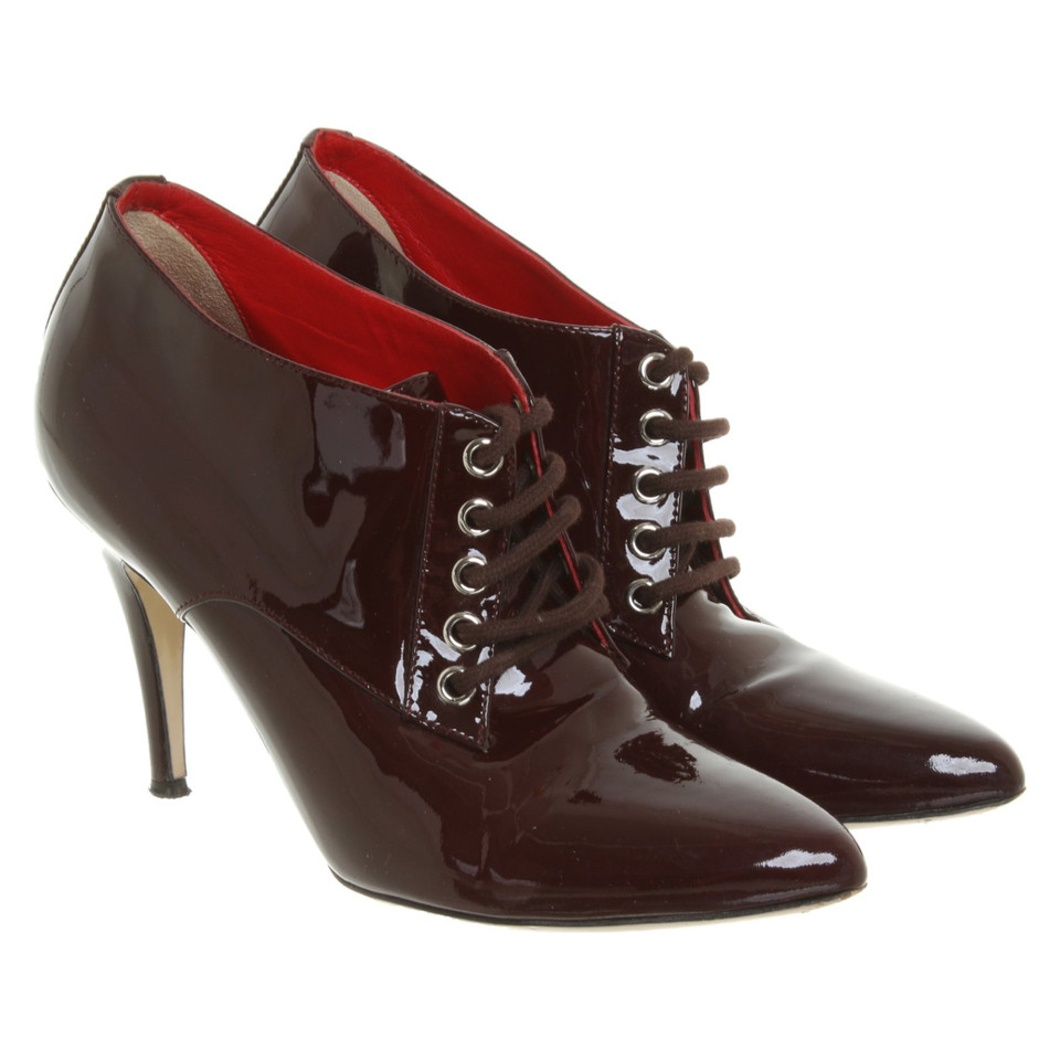 Dolce & Gabbana Stiefeletten aus Lackleder in Bordeaux