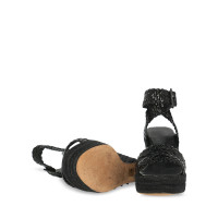 Hermès Chaussures compensées en Cuir en Noir
