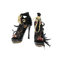Louis Vuitton Ankle boots Patent leather in Black