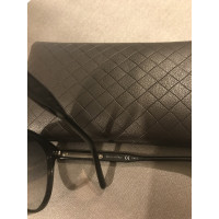 Bottega Veneta Sonnenbrille aus Leder in Schwarz