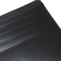 Christian Dior Täschchen/Portemonnaie aus Canvas in Schwarz
