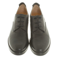 Maison Martin Margiela Lace-up shoes in masculine style