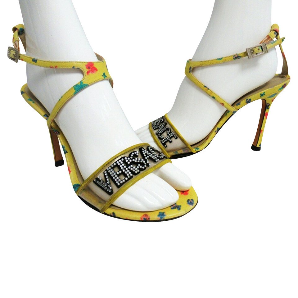 Versace Sandalen aus Leder in Gelb