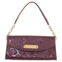 Louis Vuitton clutch with monogram pattern