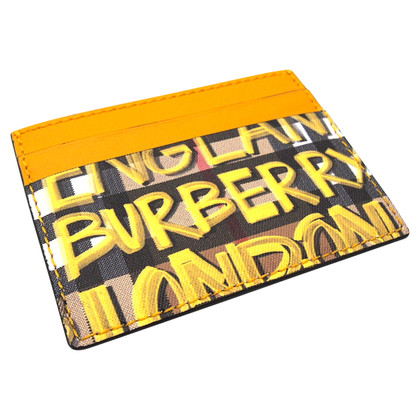 Burberry Täschchen/Portemonnaie aus Leder in Gelb
