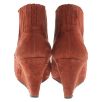 Bash Ankle boots in rust red