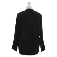 Sandro blouse de soie en noir