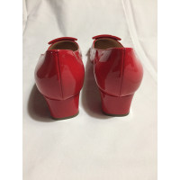 Giorgio Armani Pumps/Peeptoes Patent leather in Red