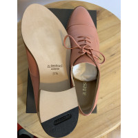 A. Testoni Chaussures à lacets en Cuir en Rose/pink