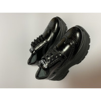 Prada Chaussures de sport en Cuir en Noir