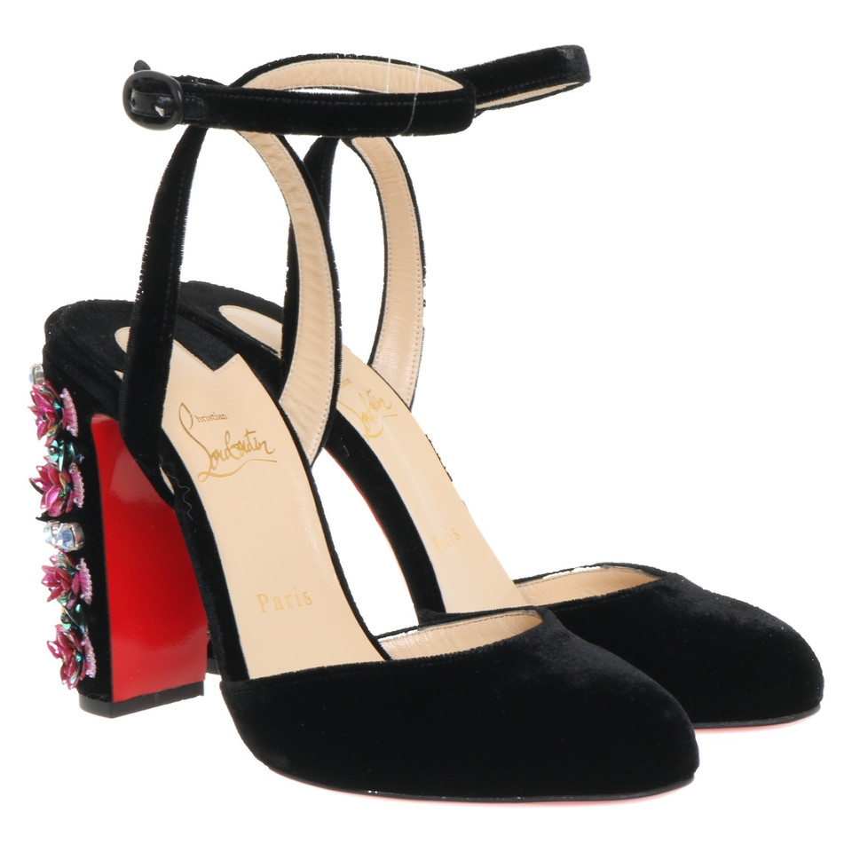 Christian Louboutin pumps with application