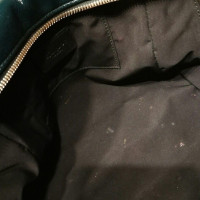Yves Saint Laurent Lackleder-Handtasche mit Monogram