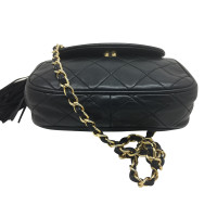 Chanel Vintage black leather carrying case with pompoms