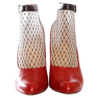 Christian Louboutin bottines en cuir rouge