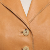 Hermès Jacke/Mantel aus Leder in Beige