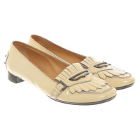 Tod's Slipper/Ballerinas aus Lackleder in Beige