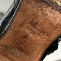 Hermès Stiefel aus Lackleder in Schwarz