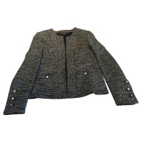 Chanel Boucle jacket mirror buttons