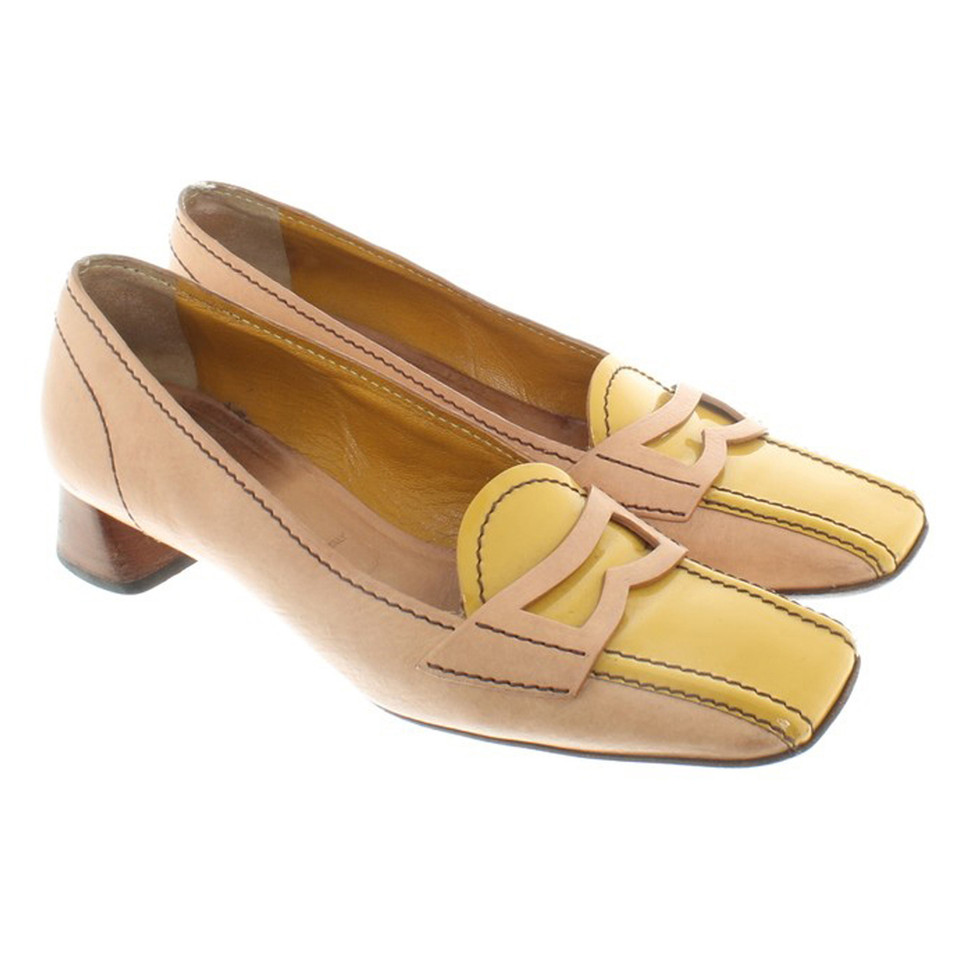 Prada pumps in beige / yellow