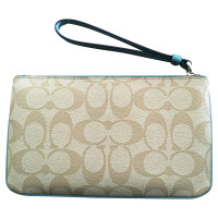 Coach clutch with pattern