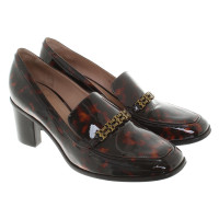 Tory Burch pumps with animal design