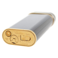 Cartier Feuerzeug in Schwarz/Gold