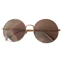 Nina Ricci Sonnenbrille in Gold